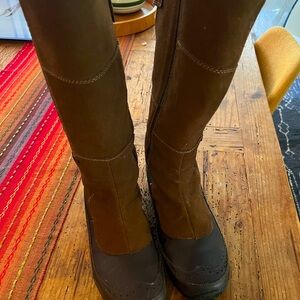 The North Face.  Barely worn women’s brown suede/leather boots, size 9.